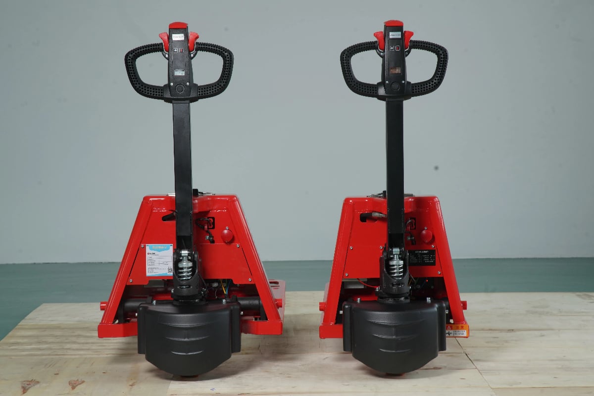 Close-up view of the ergonomic tiller handle controls on a robust Electric Pallet Truck.